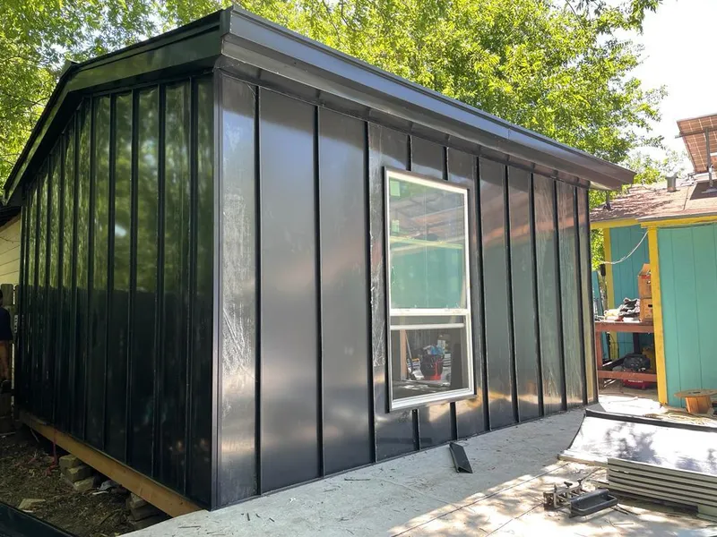 Black standing seam metal wall panels for Metal Roof Installation in Loughman